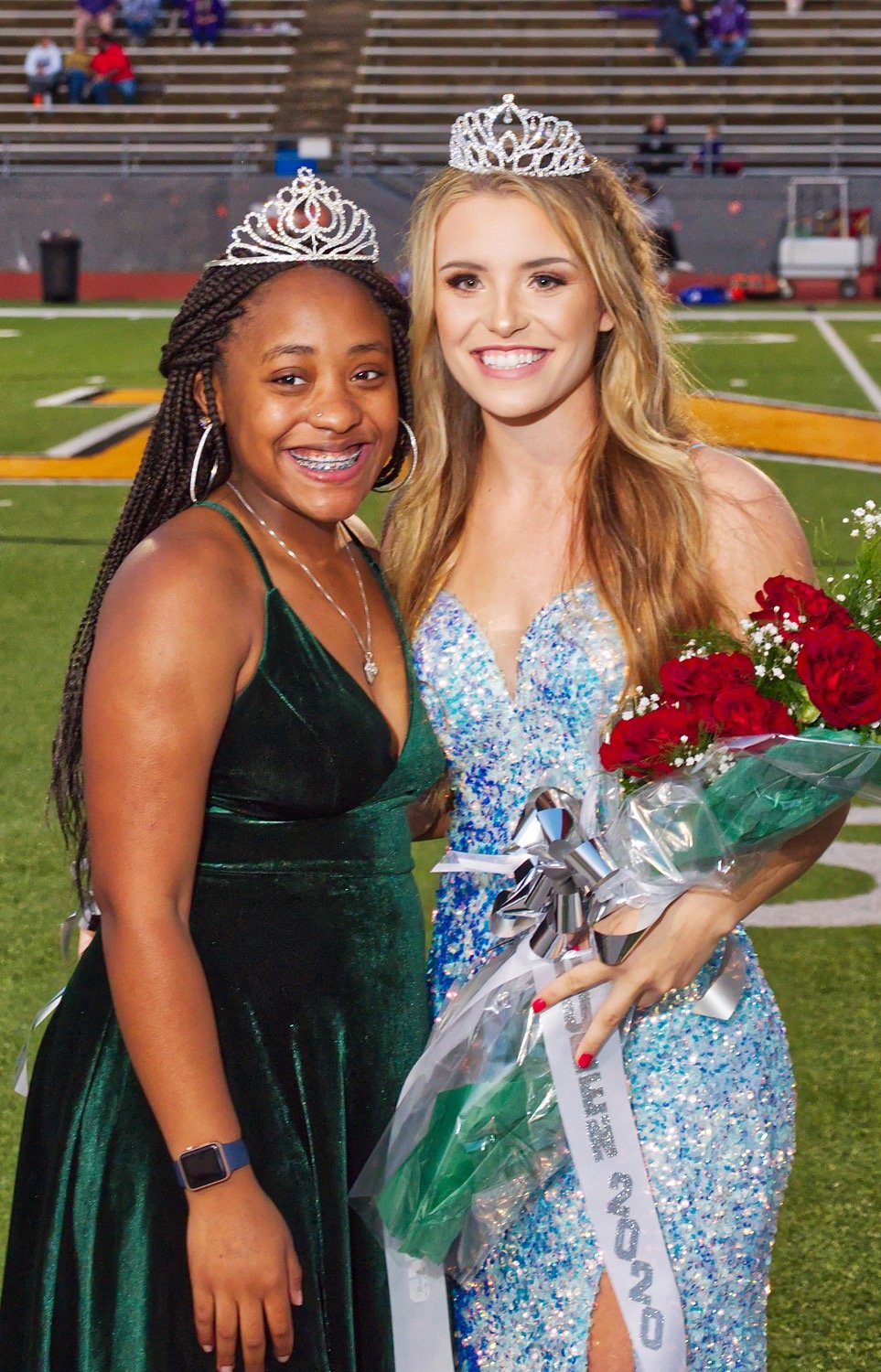 Mineola's 2019 homecoming queen Lovely Wright, at left, with newly-crowned 2020 winner Alyssa Lankford.